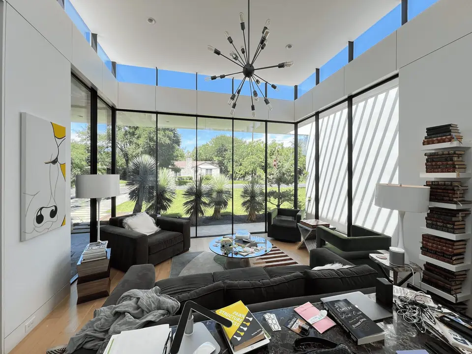 Living room with floor-to-ceiling windows and clerestory glass after a window cleaning